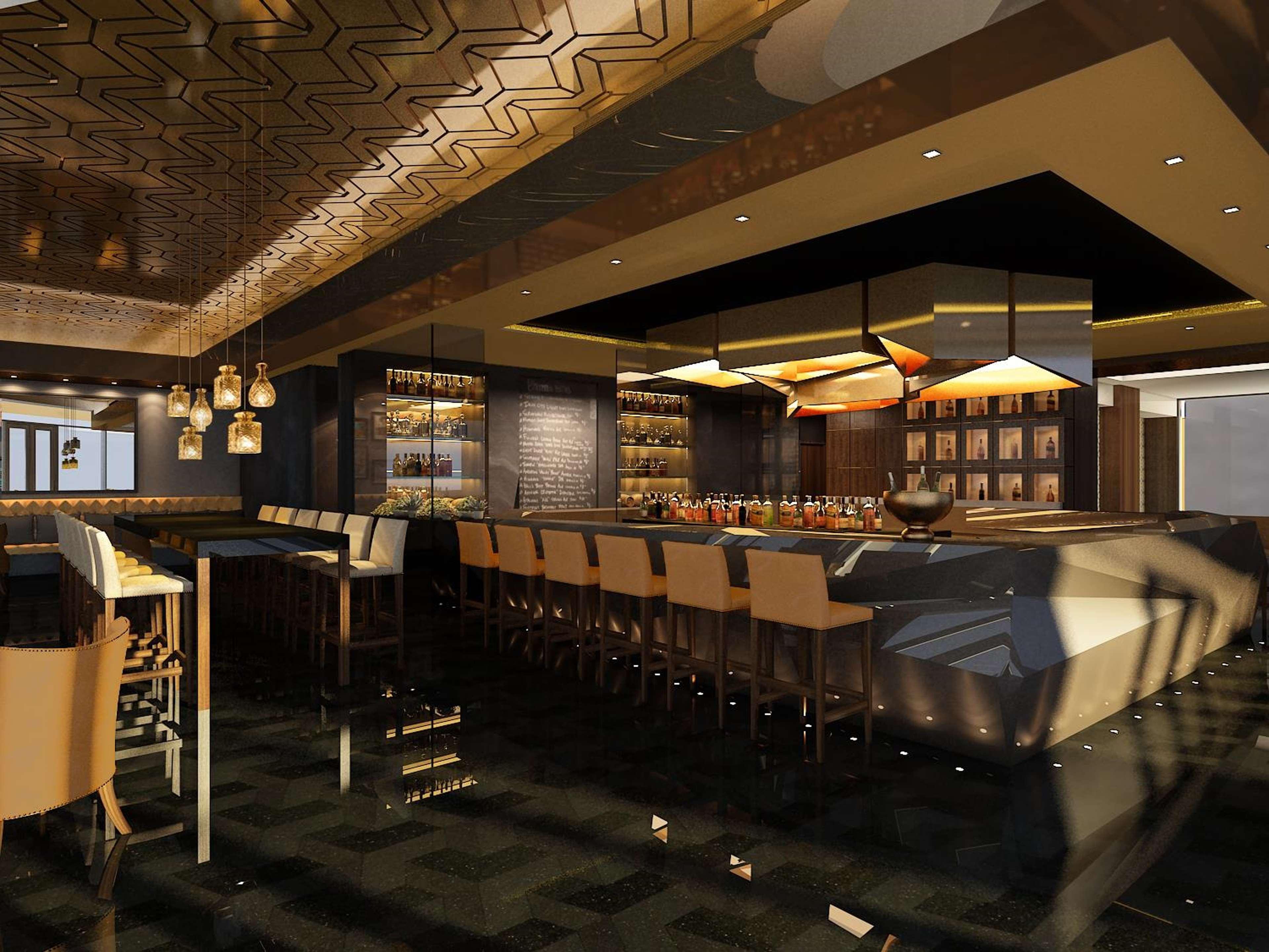 Fairmont Ajman Hotel Buitenkant foto The interior of the bar