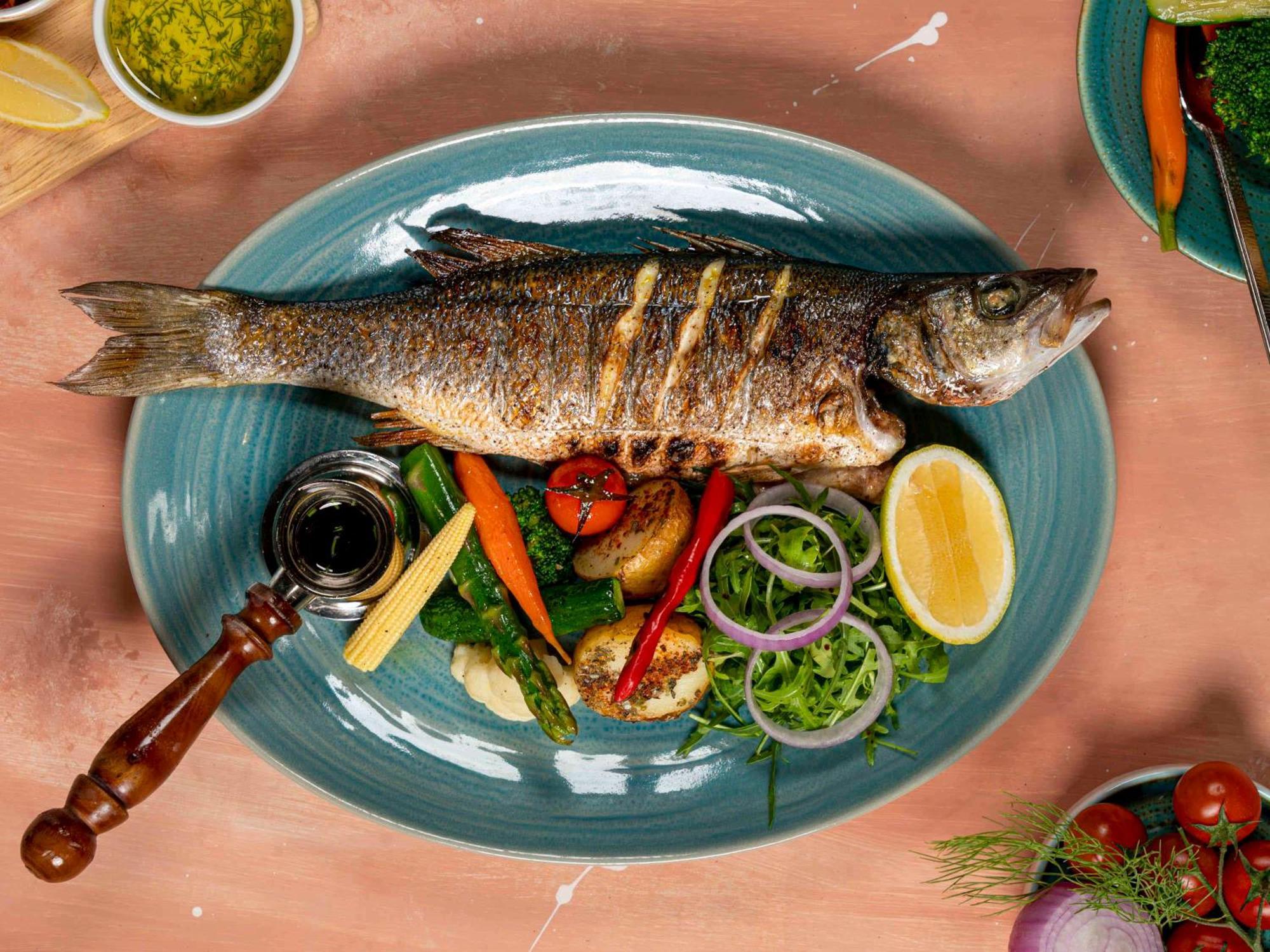 Fairmont Ajman Hotel Buitenkant foto A prepared sea bass