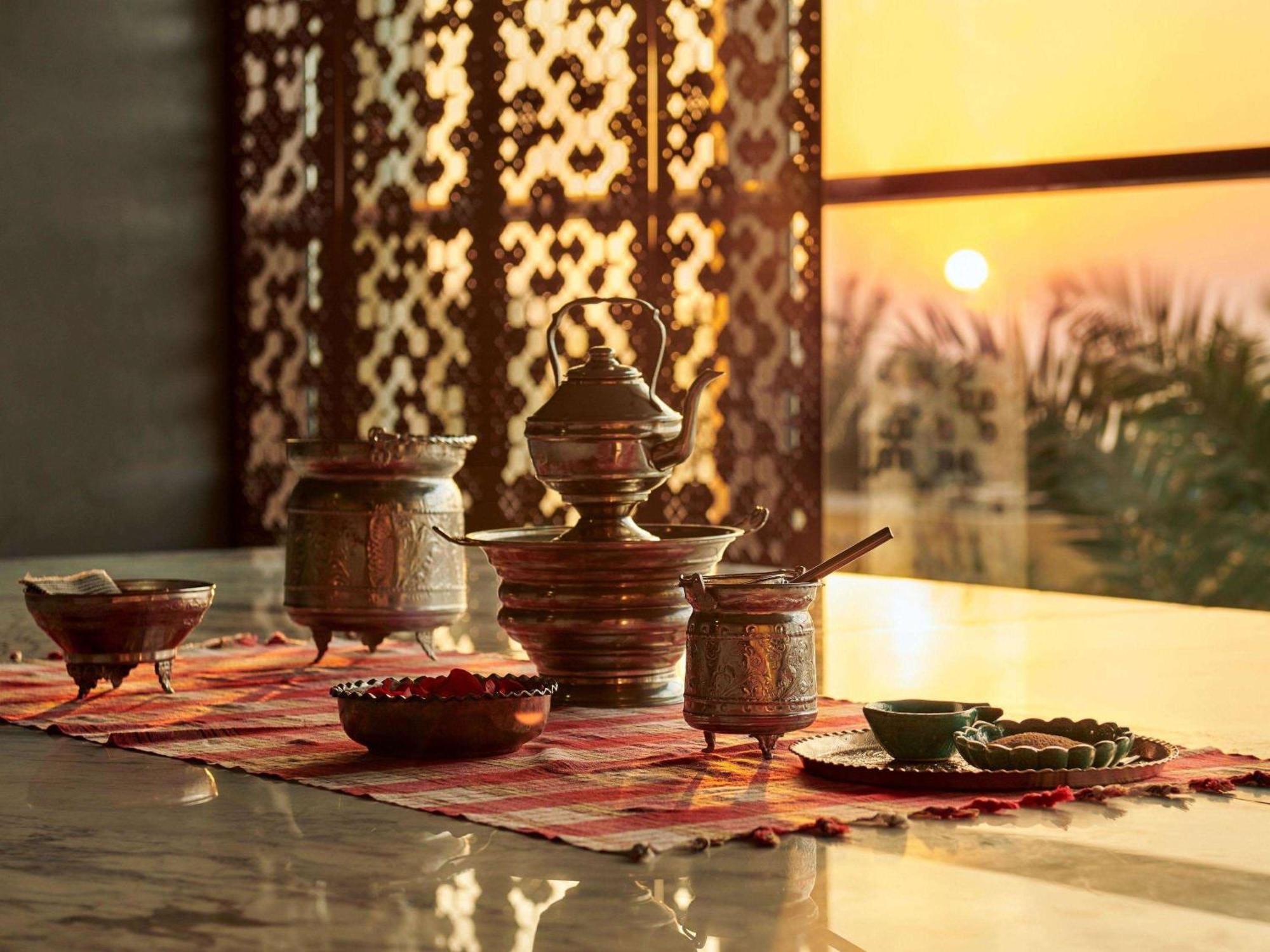 Fairmont Ajman Hotel Buitenkant foto A traditional Moroccan tea set