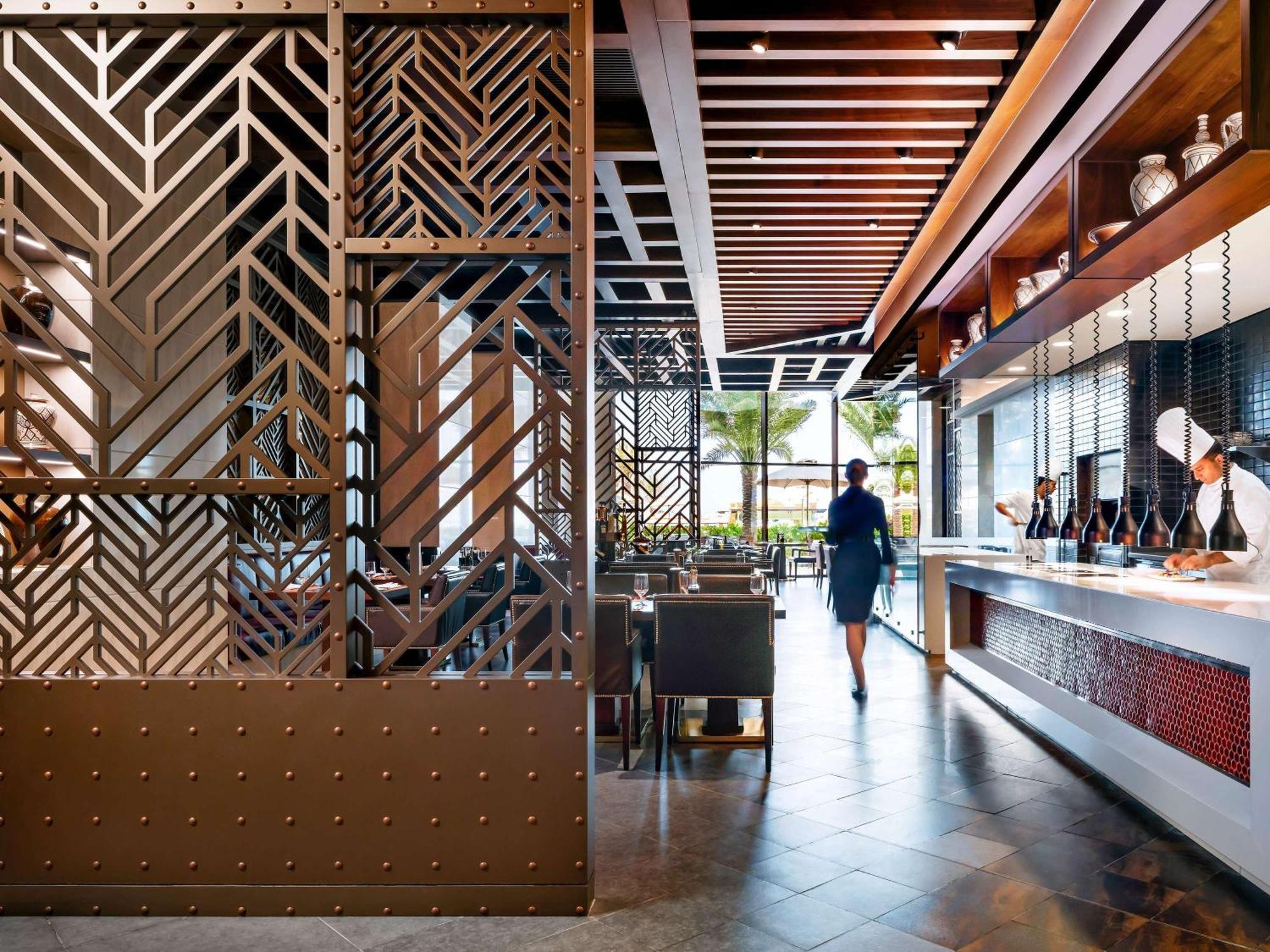 Fairmont Ajman Hotel Buitenkant foto The interior of a Starbucks Reserve store in Seattle, Washington